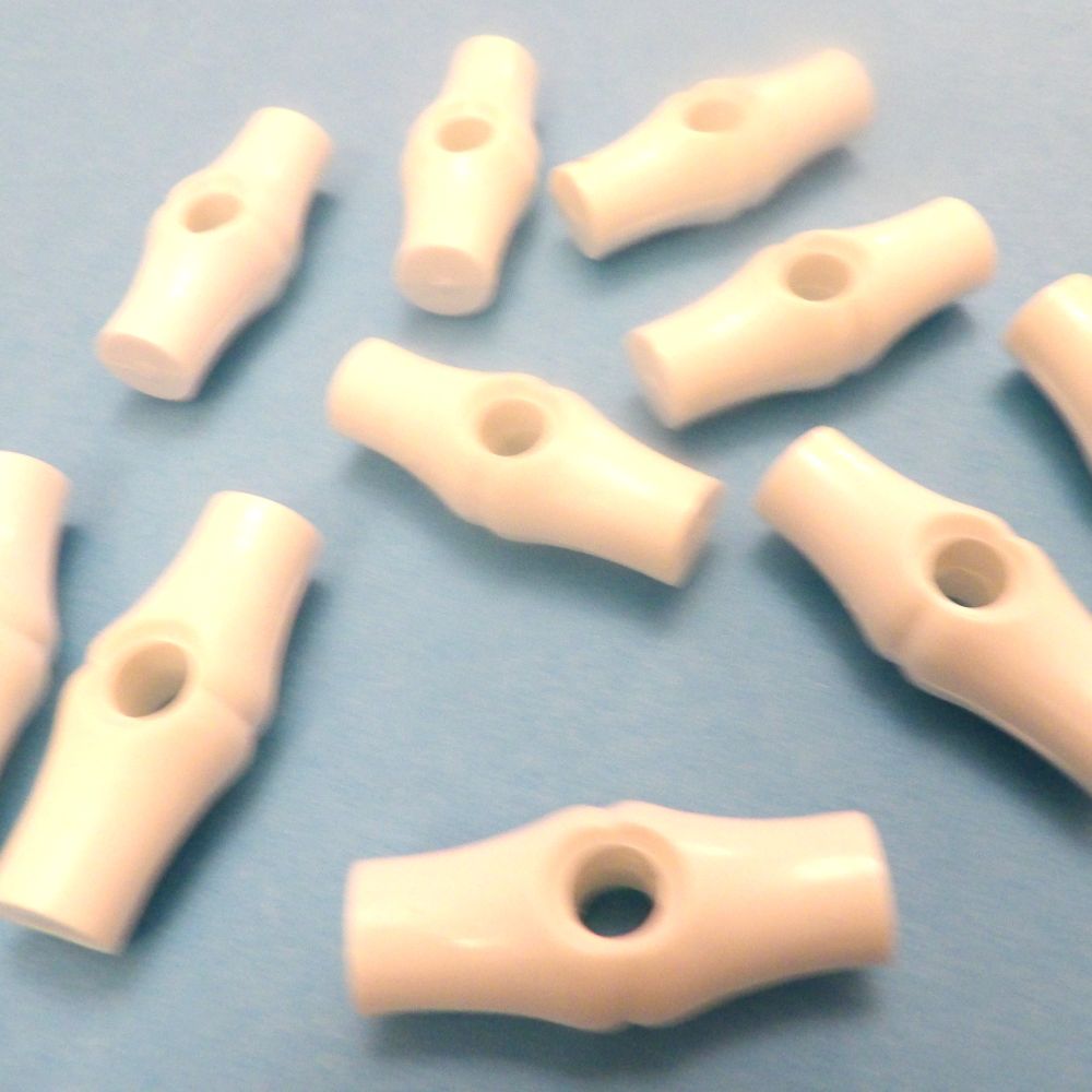 10 Light Ivory Bamboo Shape toggles With Centre Hole Size 37mm clearance