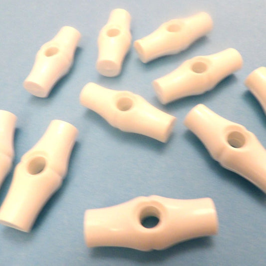 10 Light Ivory Bamboo Shape toggles With Centre Hole Size 37mm clearance