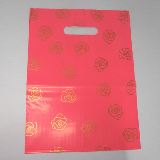 100 Small Cerise With Gold Rose Design Design Party Bags / Carrier Bags Size 23cm x 30cm / 9 x 12 Inch Clearance