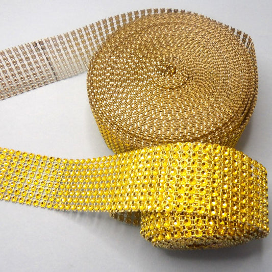 Only One Lot Of  8.5 + 1.75 Metres Of White/Gold Plastic Diamante Effect Ribbon 8 Rows 40mm Wide