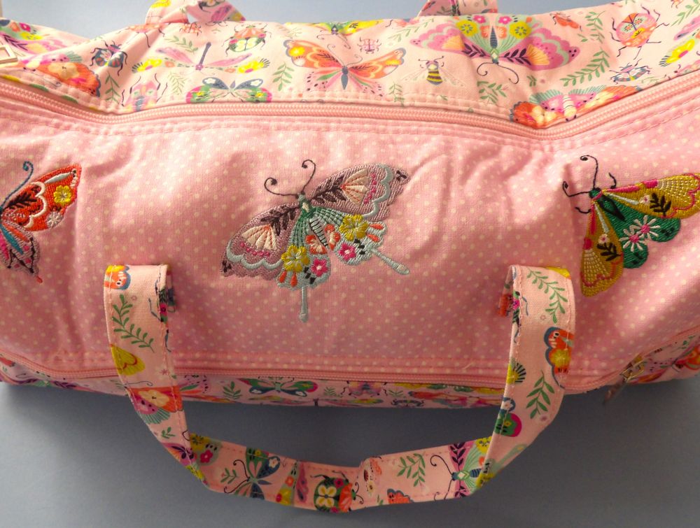 Knitting Bag Fabric Pink Colour With Bug And Butterfly Design And Embroidered Panel With Butterfly's Front Zip Pocket Size 42cm x 18cm x 16cm