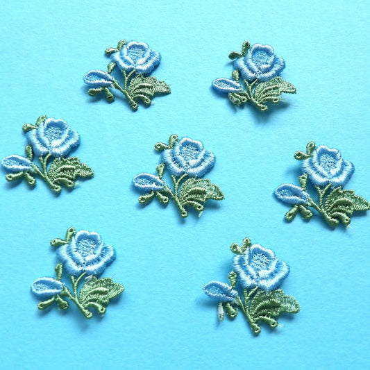 20 light blue embroidered rose sew on motifs with green leaf size 35mm clearance