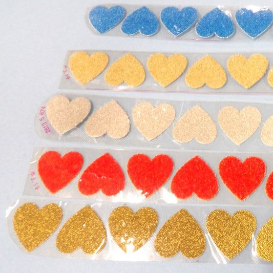 10 heart shape sparkle iron on motifs in a strip size 25mm clearance choice of colour