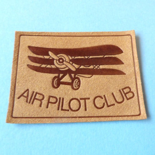 20 fawn suede type fabric motifs with AIR PORT CLUB and brown 3 winged aeroplane design 75mm x 55mm size clearance