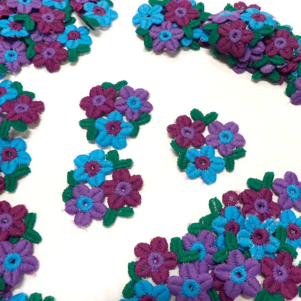 60 purple/turquoise small flower sew on motifs size 40mm x 40mm clearance