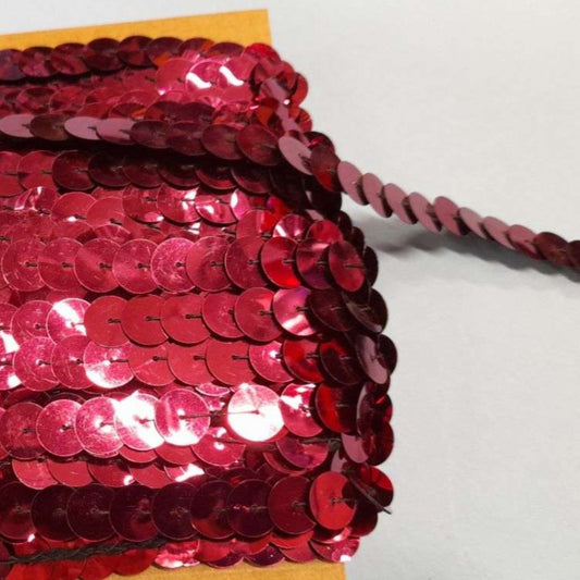 20 metre approximately of 10mm strung sequins maroon on a card clearance