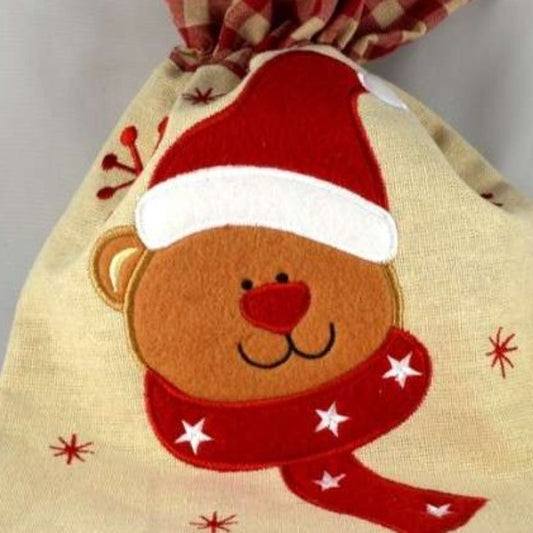 Merry Christmas cream draw string bag with teddy bear face and snowflakes design size 23cm x 32cm
