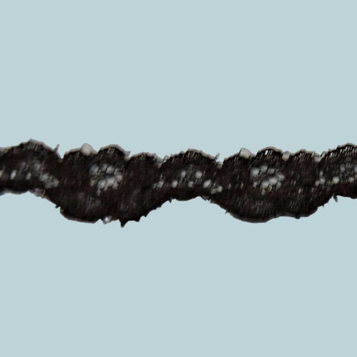 20 metres of narrow floral black lace 12mm wide loose in a bag clearance