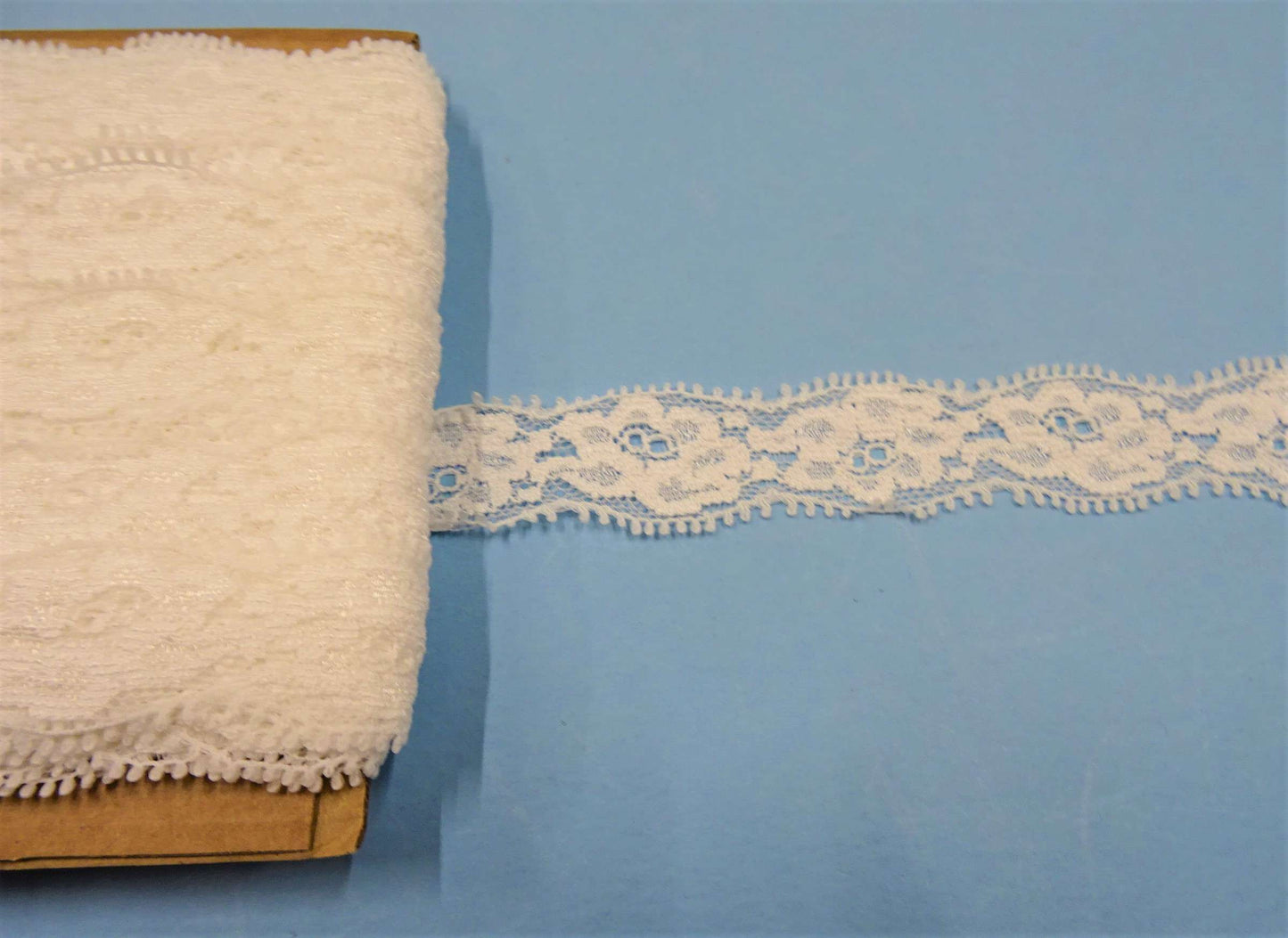 20 metres of WHITE lace with rose design 22mm wide clearance