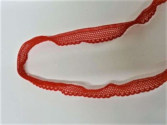 20 metres of lace type red elastic with 12mm wide loose in a bag clearance