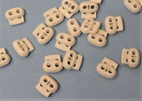 20 white spring toggles with two holes 25mm clearance