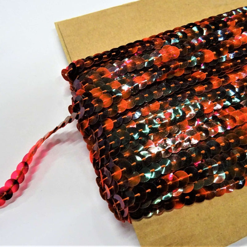 20 metre approximately of 6mm strung sequins random pattern Red / Black on a card clearance
