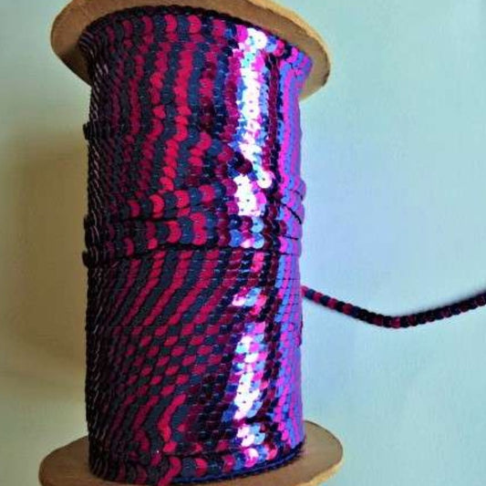 200 metre reel approximately of approximately of 6mm  strung sequins two tone Cerise / Royal Blue clearance