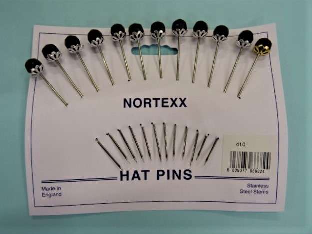 Card of 12 hat pins with black top with fancy silver cup