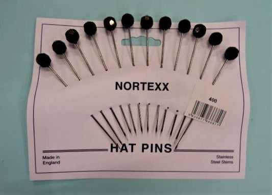 Card of 12 hat pins with black faceted top