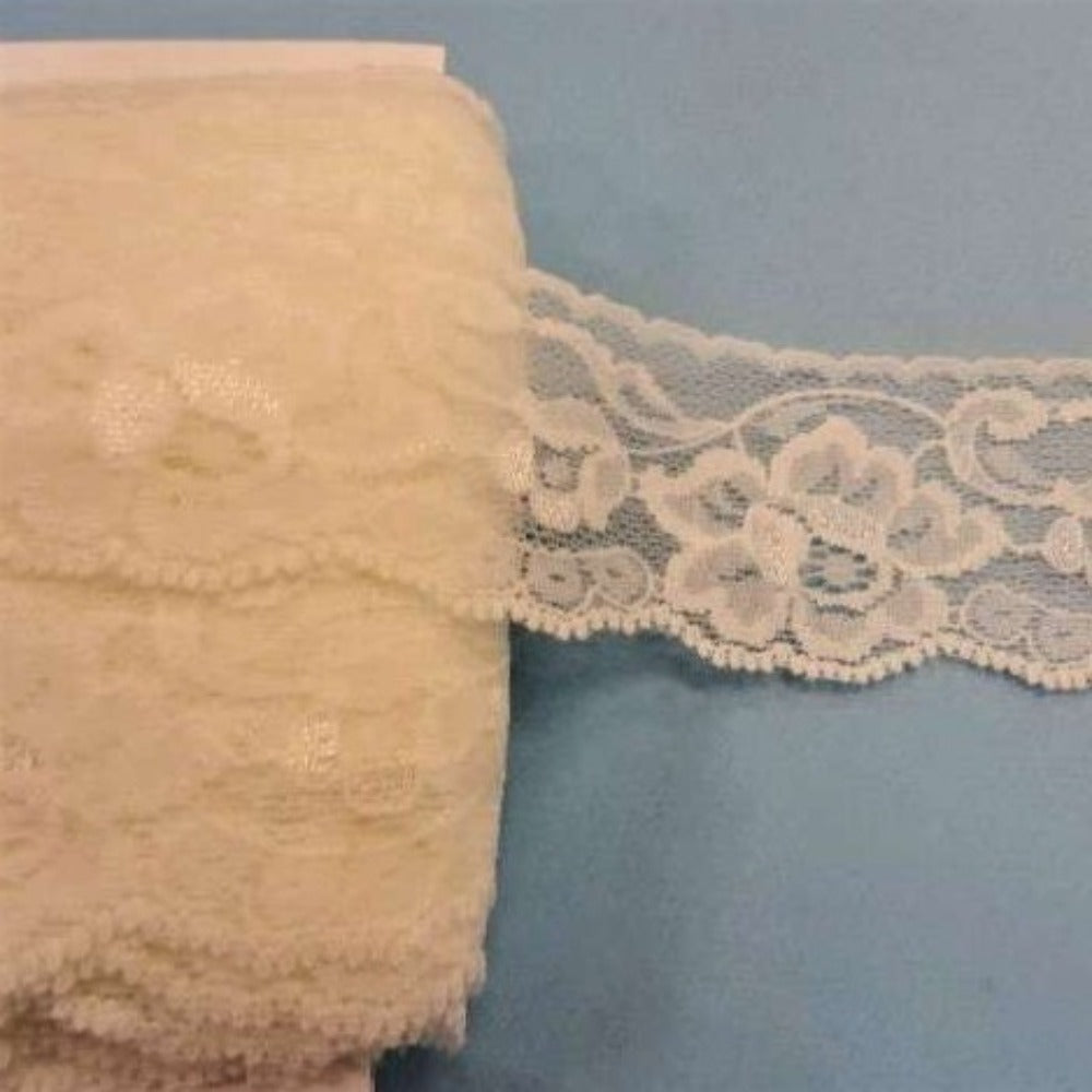 20 metres of ivory lace with flower design 40mm wide clearance