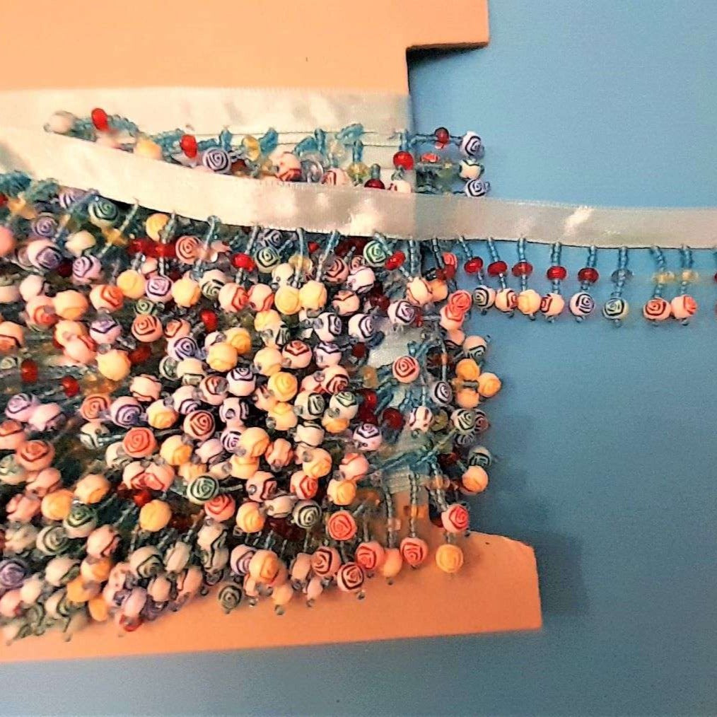 10 metres of turquoise colour beaded fringing with rose pattered coloured beads 10mm ribbon 30mm wide clearance