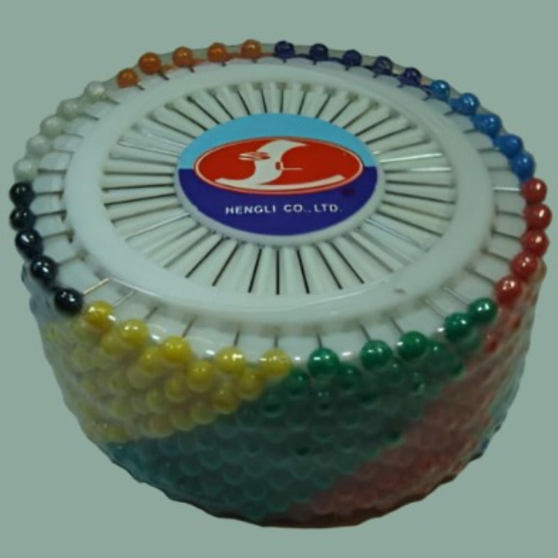 12 rosettes of plastic headed pins assorted colours