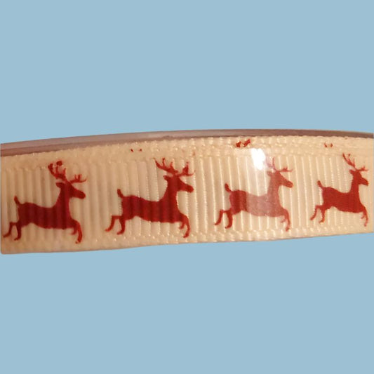 20 metres of 9mm cream ribbon with dark red reindeers