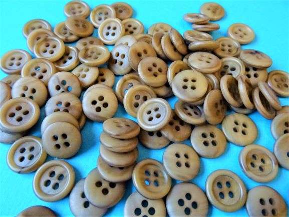 100 dark fawn 4 hole buttons size 15mm clearance