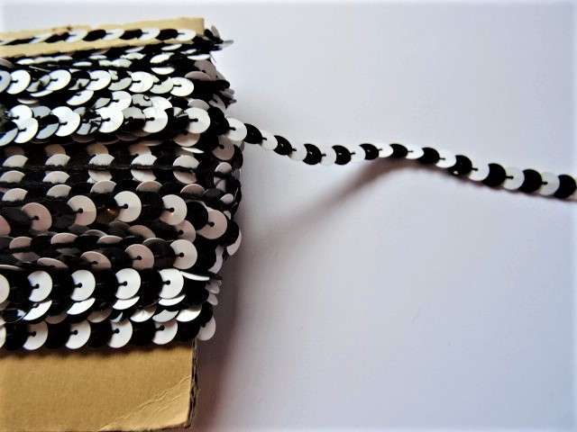 25 metre card of approximately of 6mm  strung sequins two tone Black / White clearance