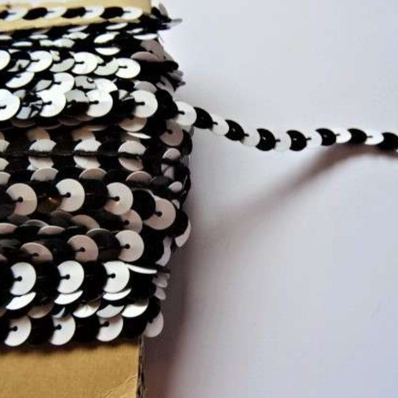 20 metre card of approximately of 6mm  strung sequins two tone Black / White clearance