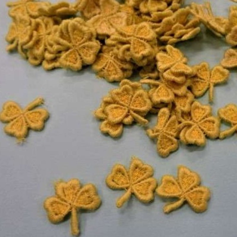 120 small clover leaf sew on motifs yellow with light green edge 20mm clearance