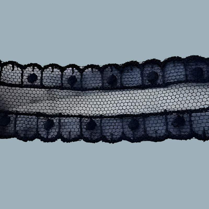 8.5 metres approximately of navy lace 25mm wide clearance loose in a bag