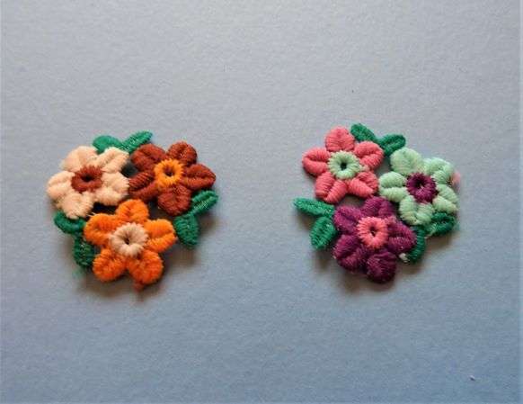 50 small flower iron on motifs size 40mm x 40mm clearance