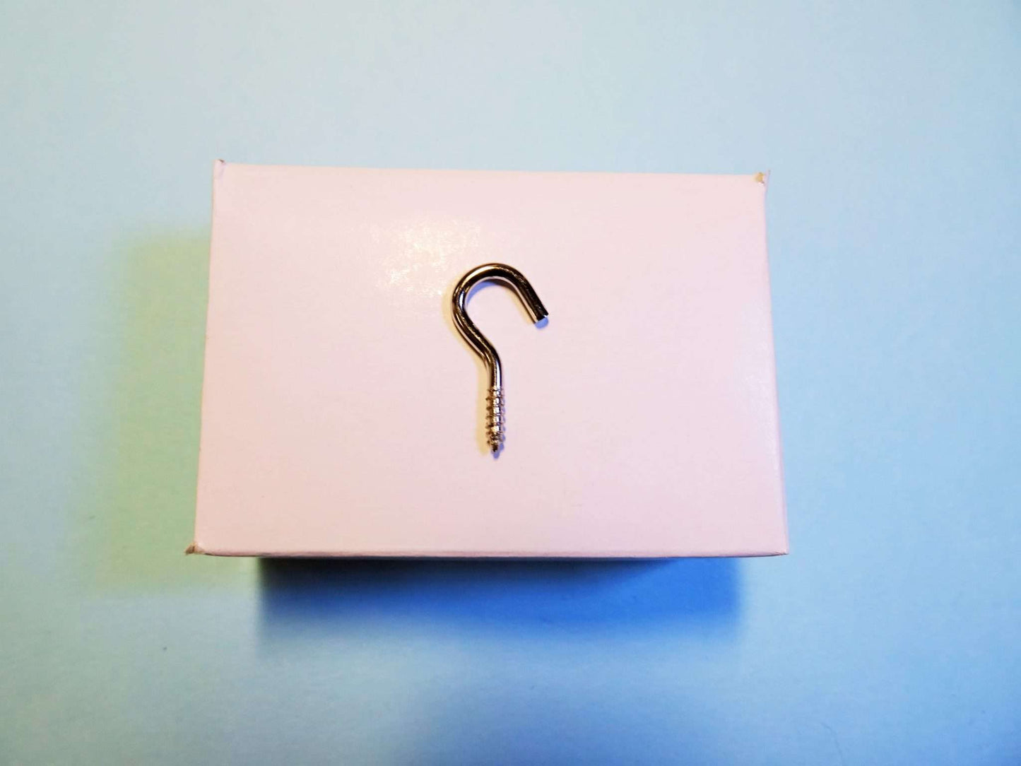 200 silver coloured hooks for curtain wire