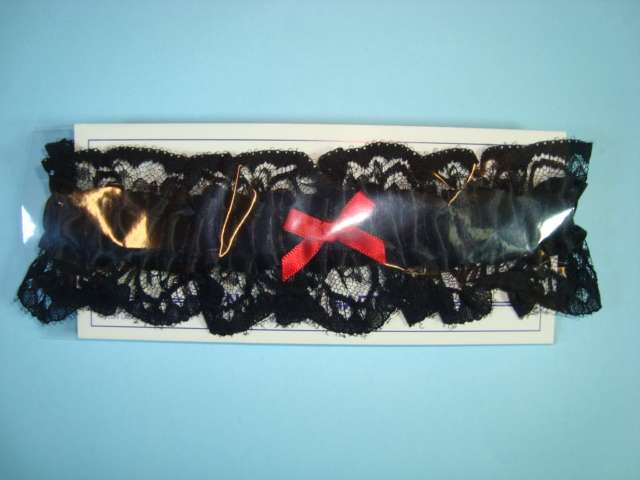 Black garter with red bow