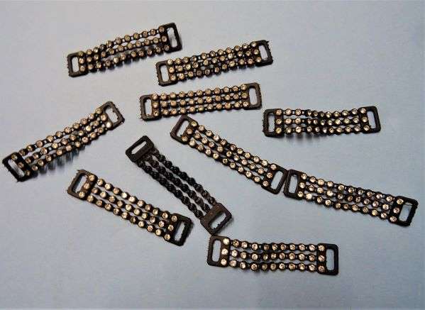 10 black plastic strips with 3 rows of 11 clear 3mm diamantes with loop at each end 65mm x 15mm