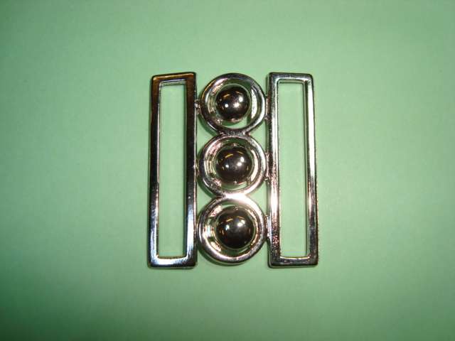 Silver coloured metal clasp buckle