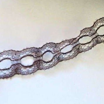 15 metres approximately of black like knitting in lace with holes lace 19mm wide clearance