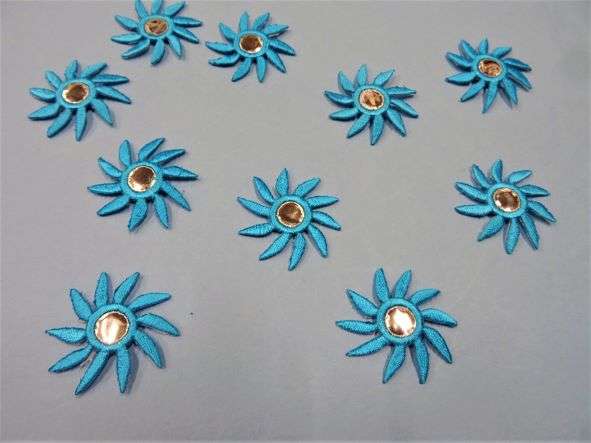 10 turquoise iron on embroidered motifs sun design with mirror type centre size 35mm clearance