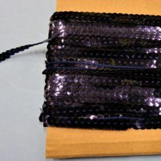 20 metre approximately of 6mm strung sequins NAVY on a card clearance