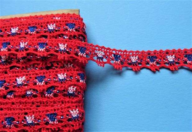 20 metres of red lace with white and royal blue 15mm wide clearance